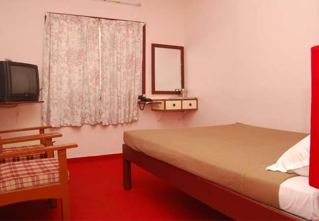Gps Hotel Kodaikanal Værelse billede